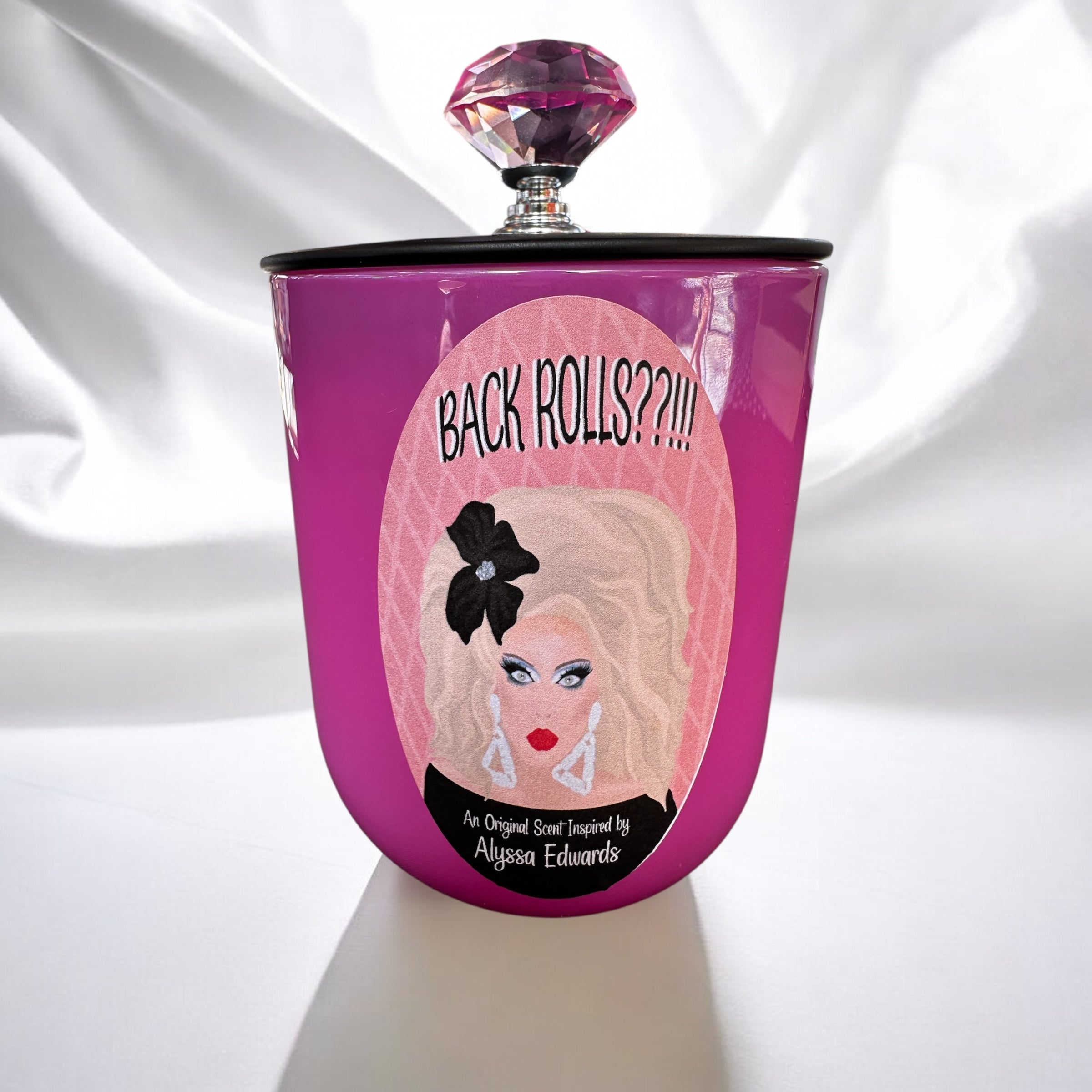 Pink candle featuring Alyssa Edwards and “Back Rolls” text on a white background