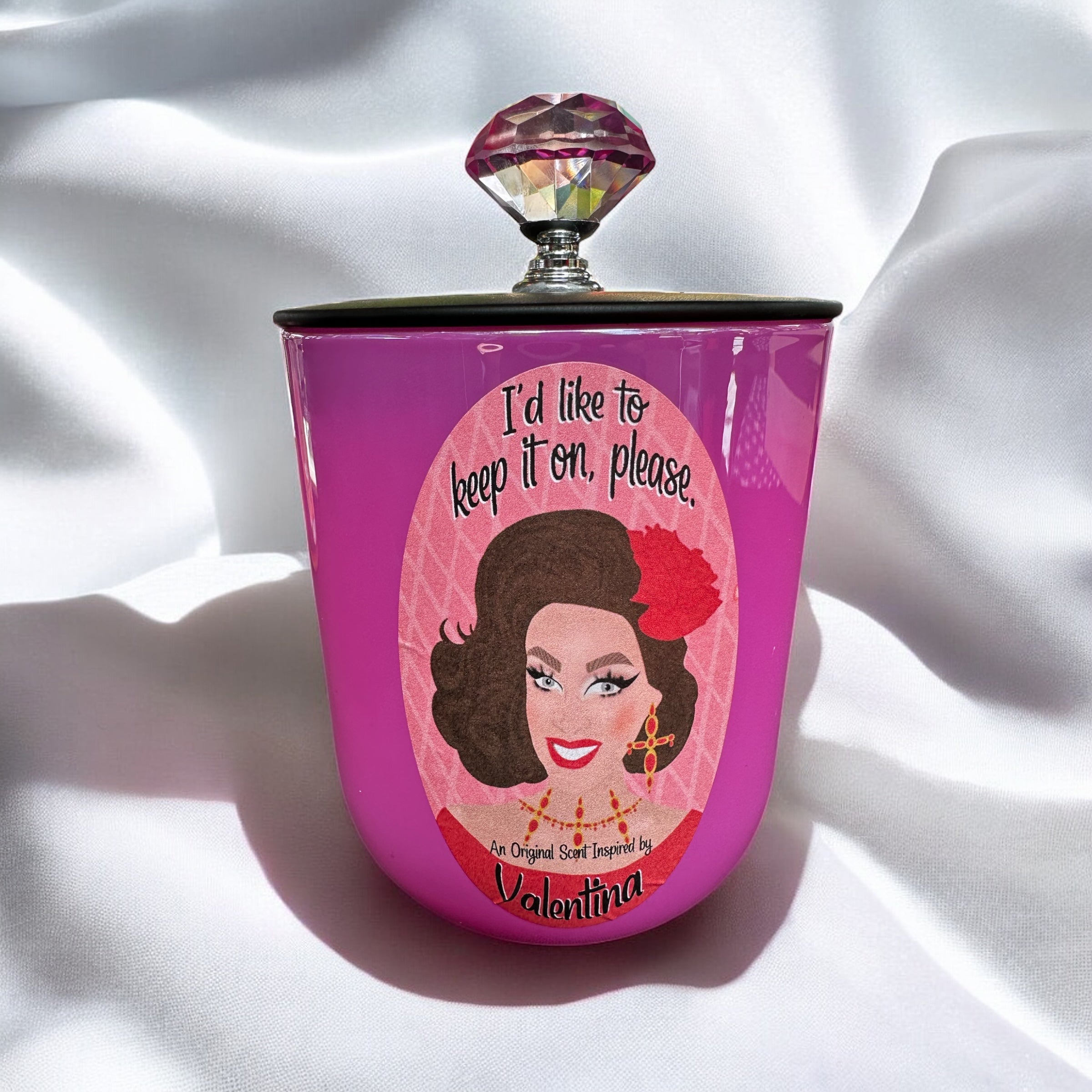 Pink candle with a decorative lid featuring Valentina and text on a white background