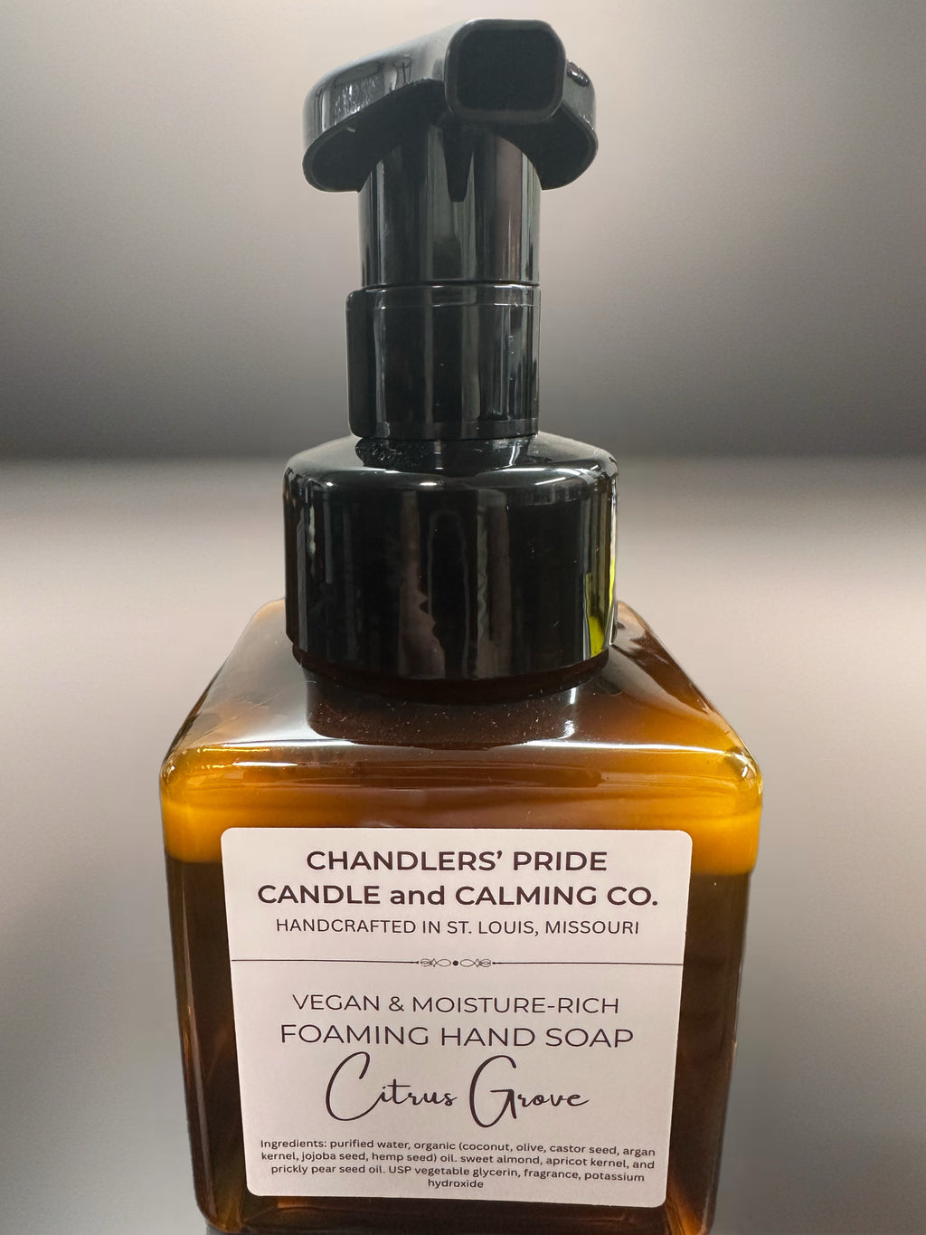 Moisture-rich Foaming hand soap bottle with pump labeled 'Chandlers' Pride Candle & Calming Co.' on a neutral background